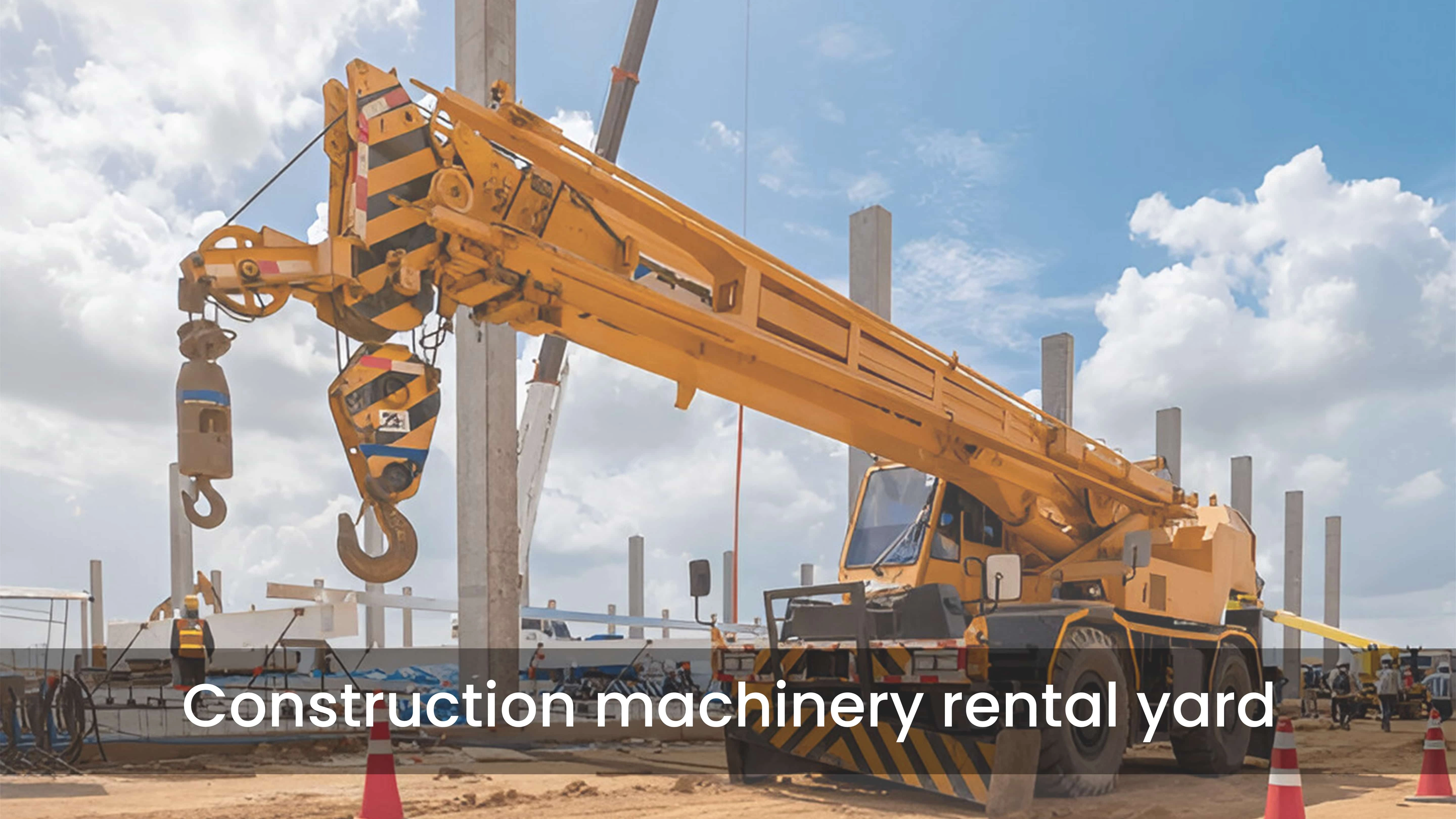 Construction machinery rental yard Line of excavators and cranes available for rent at an Indian construction site.