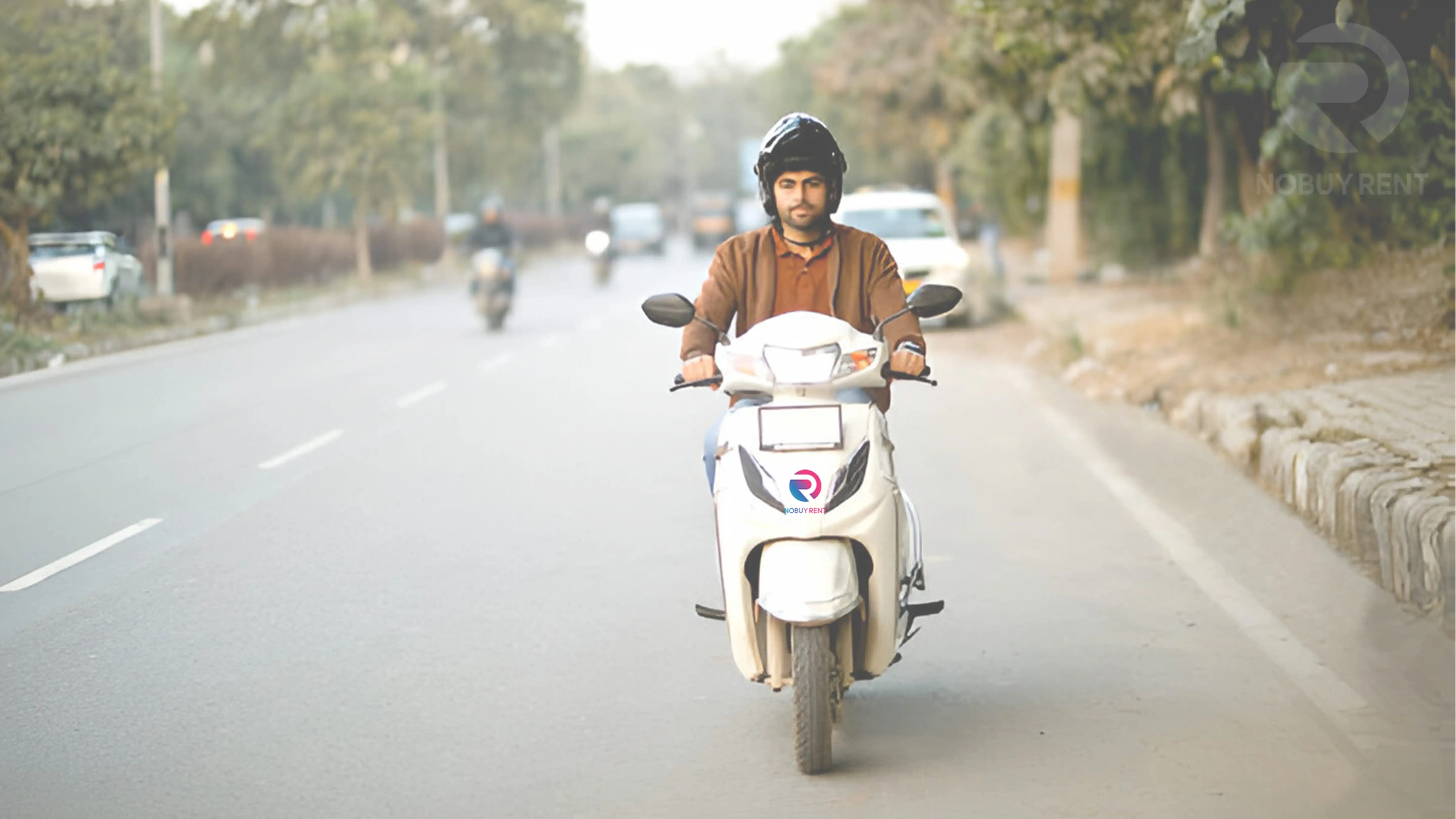 Online Vehicle Rental Hired electric scooter ridden by young man going down city street